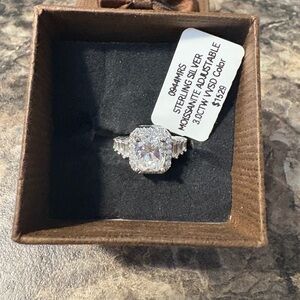 3.0 CTW VVDS Moissanite cushion cut in Sterling Silver. Adjustable Ring size 7